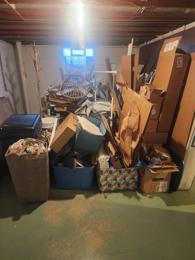 Roll-off dumpster container at job site for 4 Yard Dumpster Rental in Marshfield